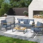 Ensemble de canapés de jardin moderne 4 pièces – Structure en fer avec coussins gris et table basse aspect bois