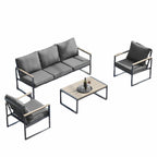 Ensemble de canapés de jardin moderne 4 pièces – Structure en fer avec coussins gris et table basse aspect bois