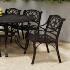 Ensemble de salle à manger d'extérieur 7 pièces en aluminium bronze Sanibel avec table à manger ovale de 72 et six fauteuils par Homestyles