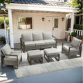 Canapé d'angle d'extérieur avec pouf et fauteuil de jardin - Gris